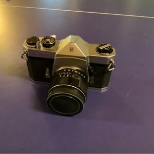 Vintage Pentax Black and Silver Camera